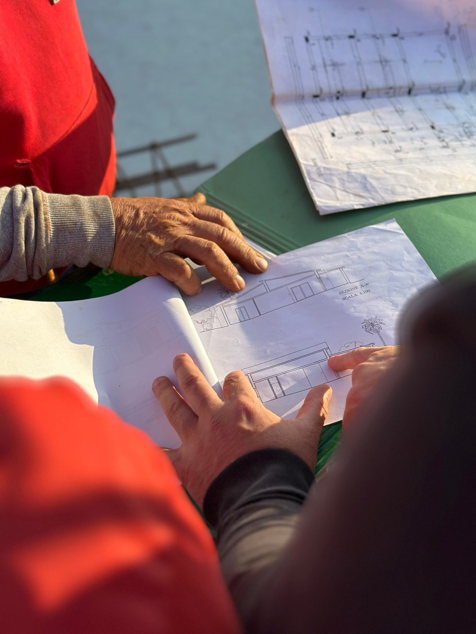 Blueprints being reviewed on site