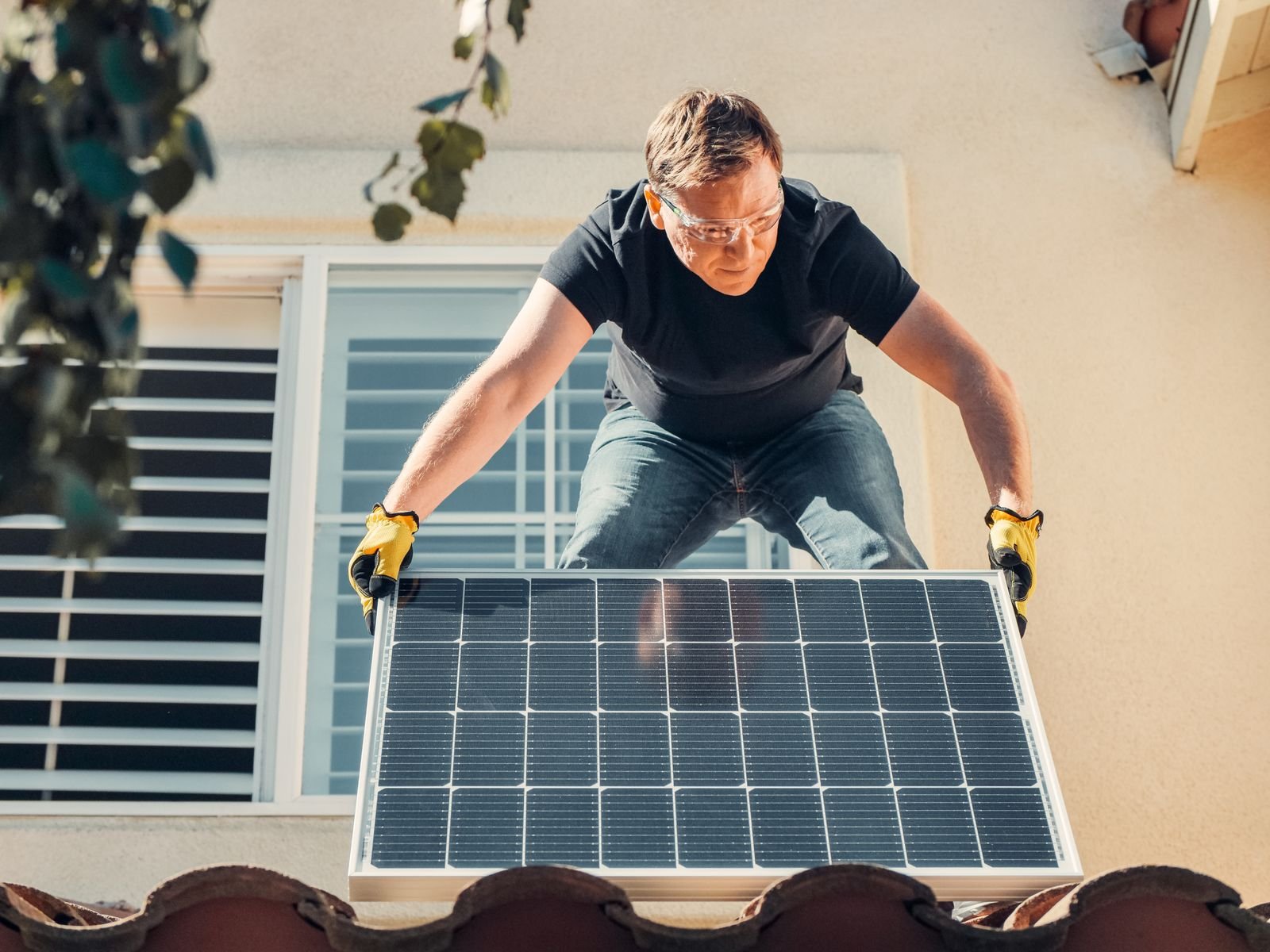 Installing solar panels on a roof
