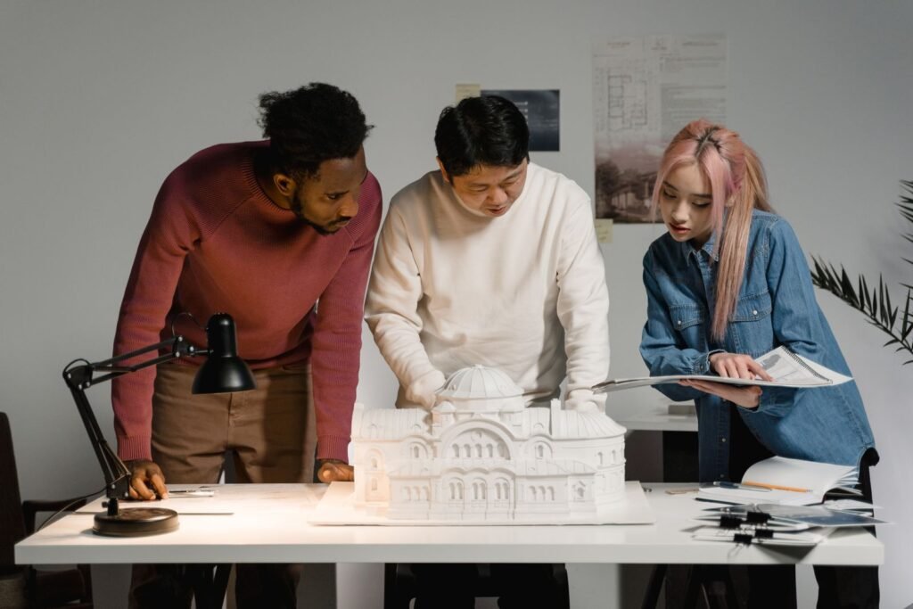 Architects reviewing a scale model together
